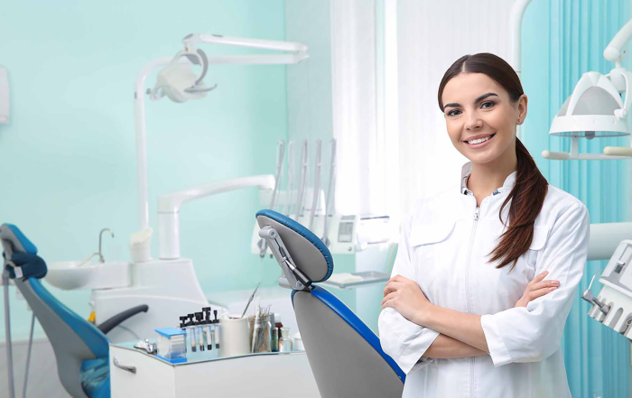 female dentist in dental office