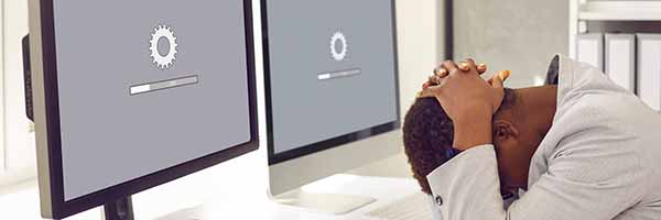 website loading slow. business woman is frustrated.