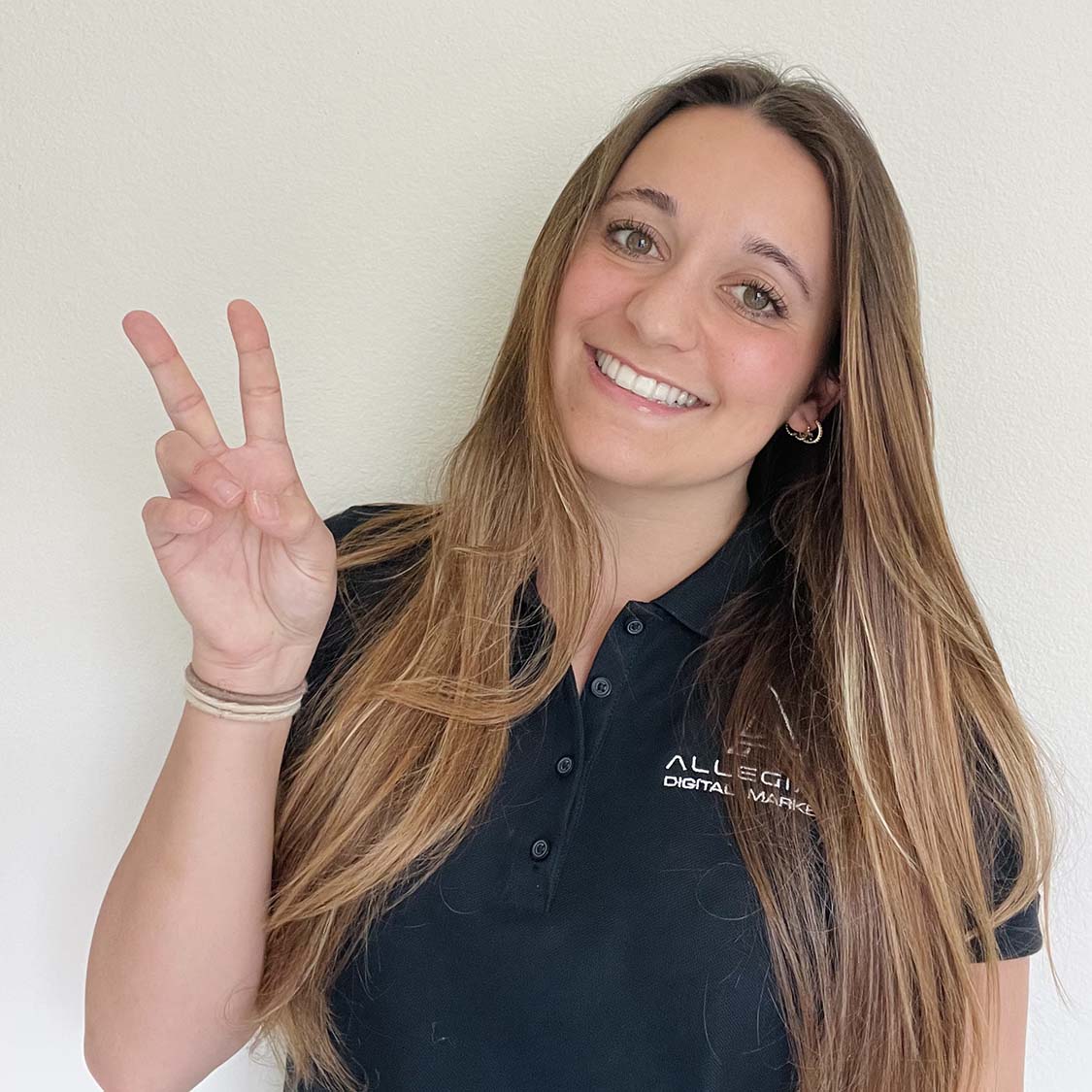 Karina San Roman Website Designer of Allegiant Digital Marketing™ After Photo